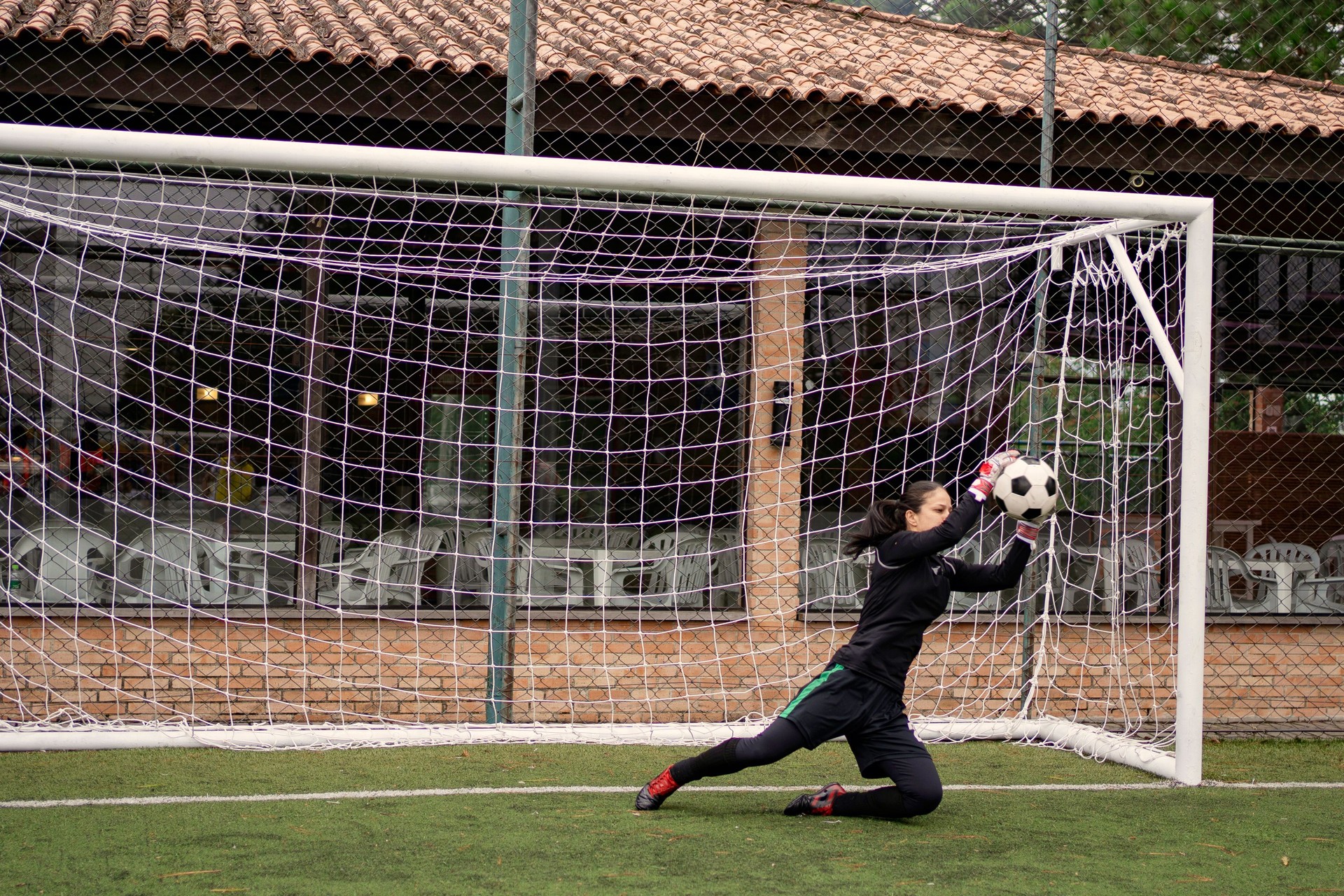 Female goalkeeper Catching the ball